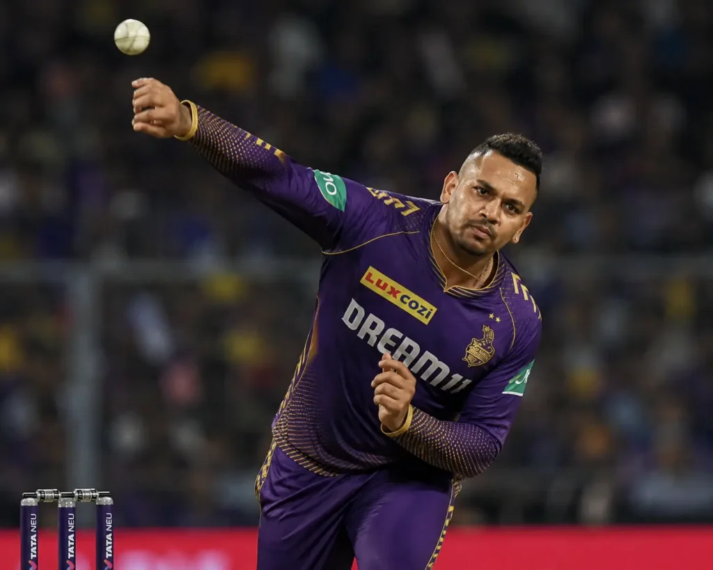 KKR spinner Sunil Narine bowling during KKR vs MI live cricket match